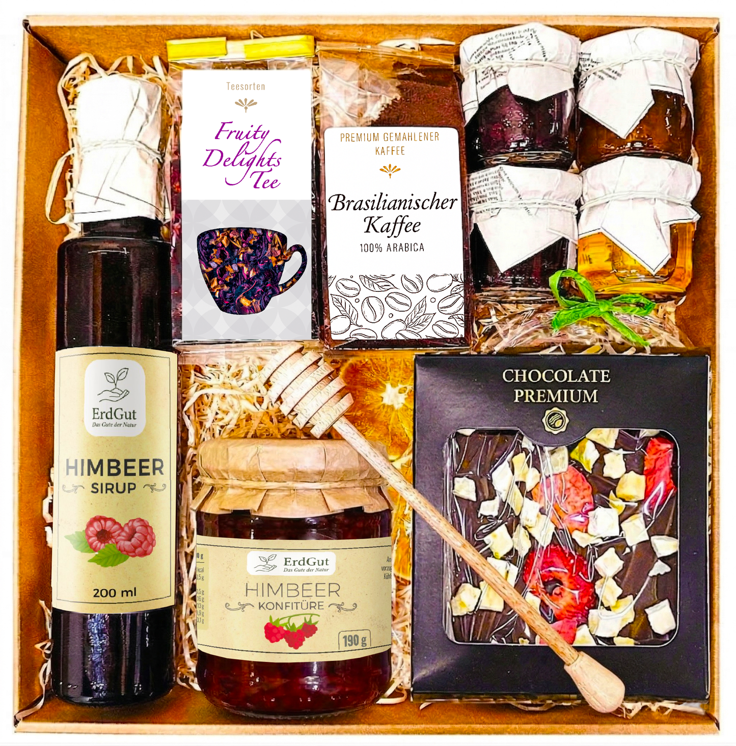 Geschenkkorb mit Tee, Honig, Schokolade und Konfitüre